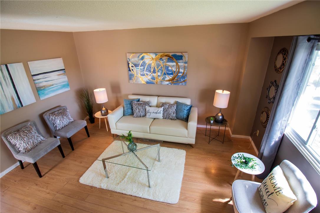 Winnipeg Town House Staged by The Home Stylists - Sold $51,000 Above Ask!