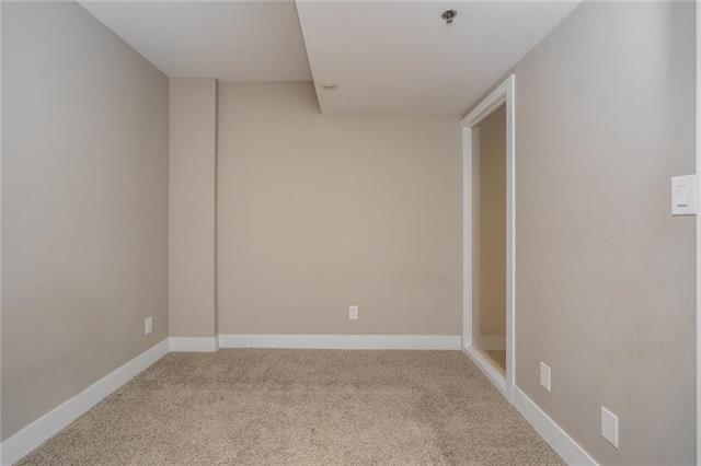 Bedroom before home staging by the Home Stylists, Winnipeg - taken from a different vantage point